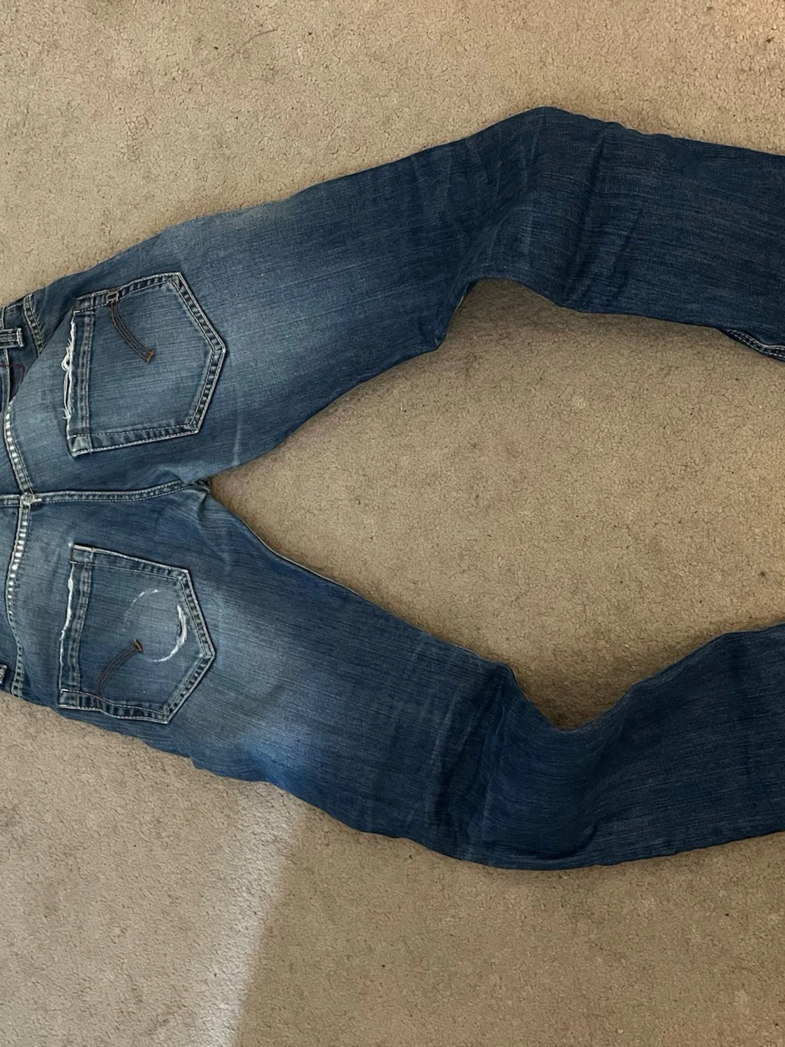 Blå slitna skinny jeans herr - 1