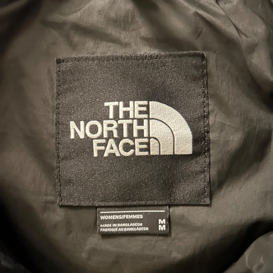 Svart pufferjacka från The North Face - 93