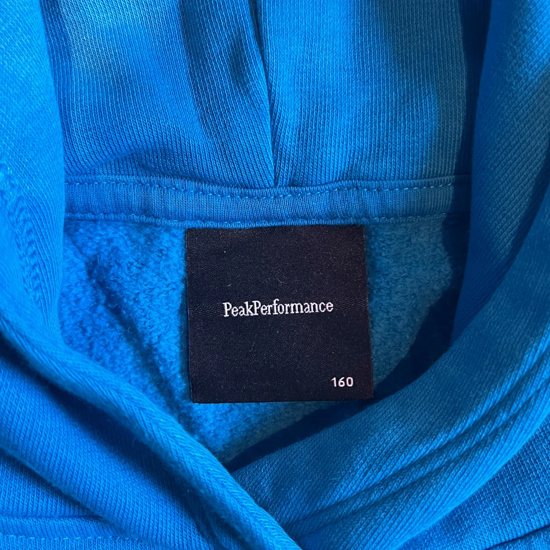 Blå hoodie från Peak Performance - 2