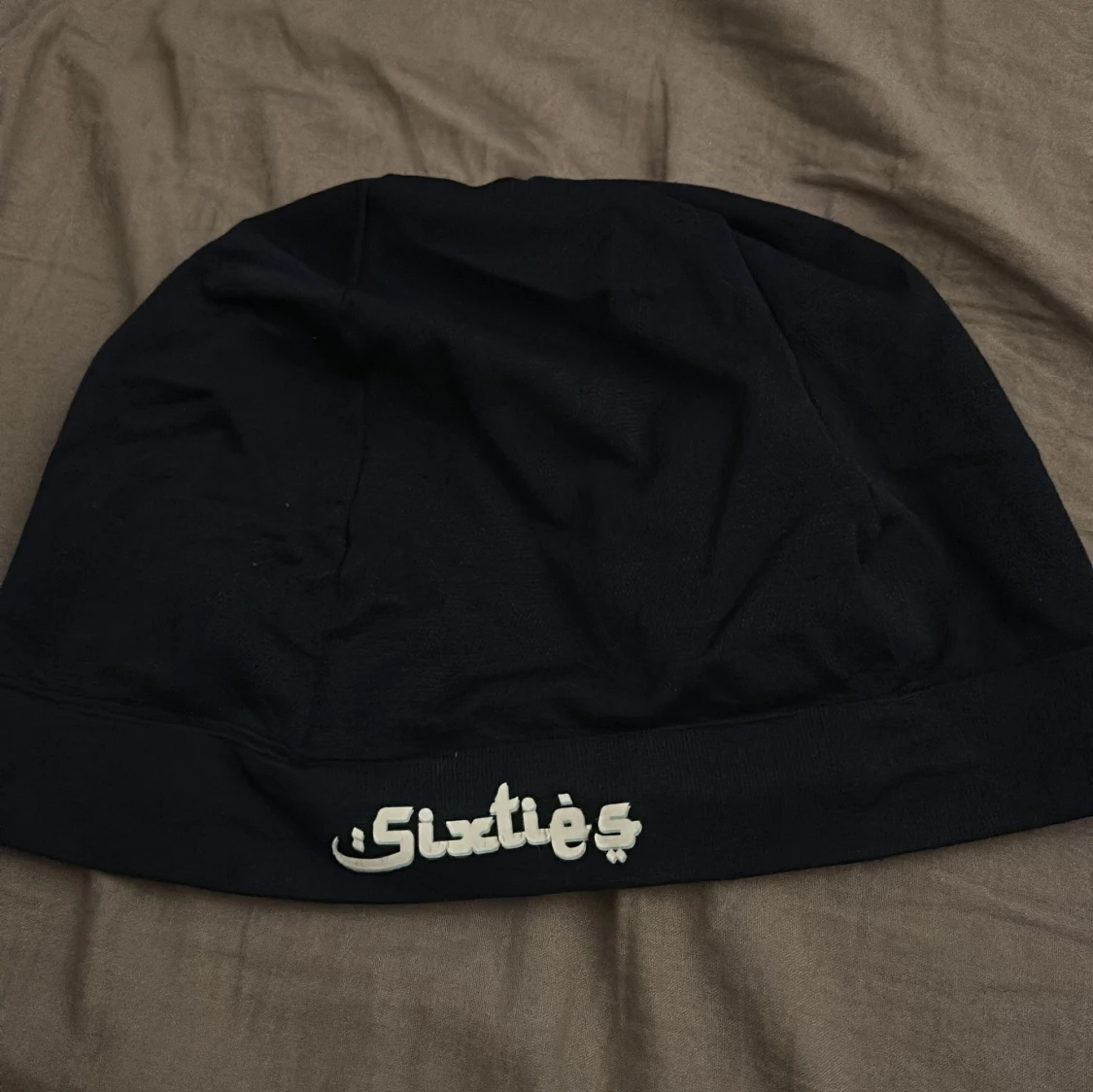 marinblå mössa från Sixties