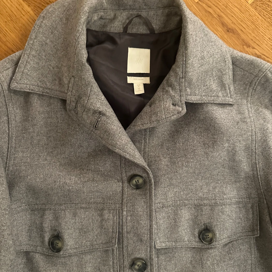 Grå ulljacka från H&M - 90