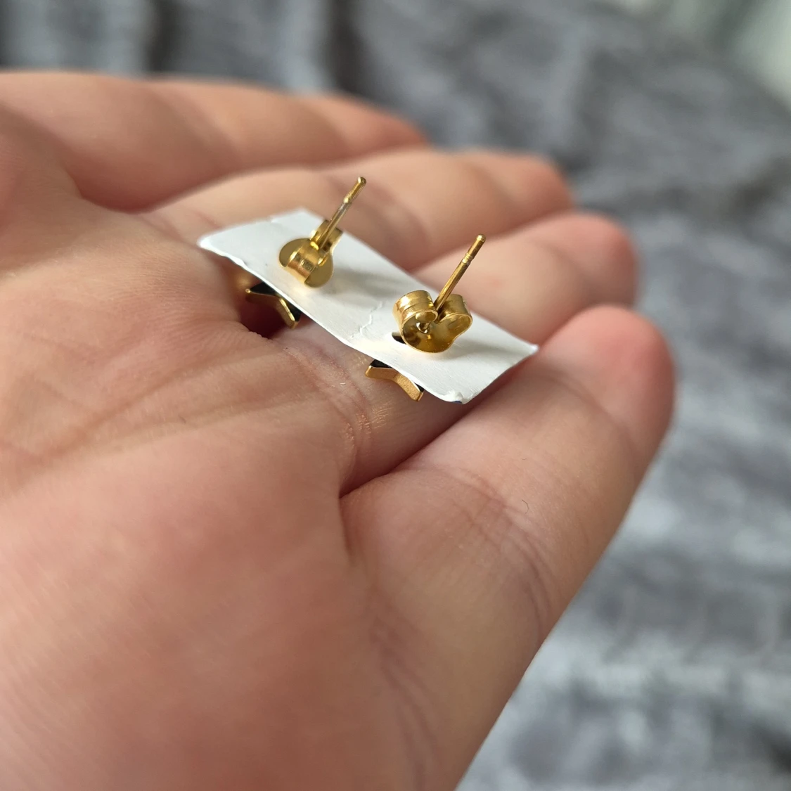 Guldstjärna örhängen från Sence - 1