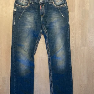 Vintage jeans - Skit snygga jeans som liknar true religion med den synliga sömmen!! 