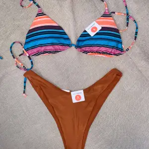 Färgrik bikini i storlek S. Toppens originalpris 179kr. Säljer bägge för 25