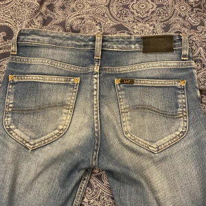 Lågmidjade jeans - Lågmidjade bootcut Lee jeans 