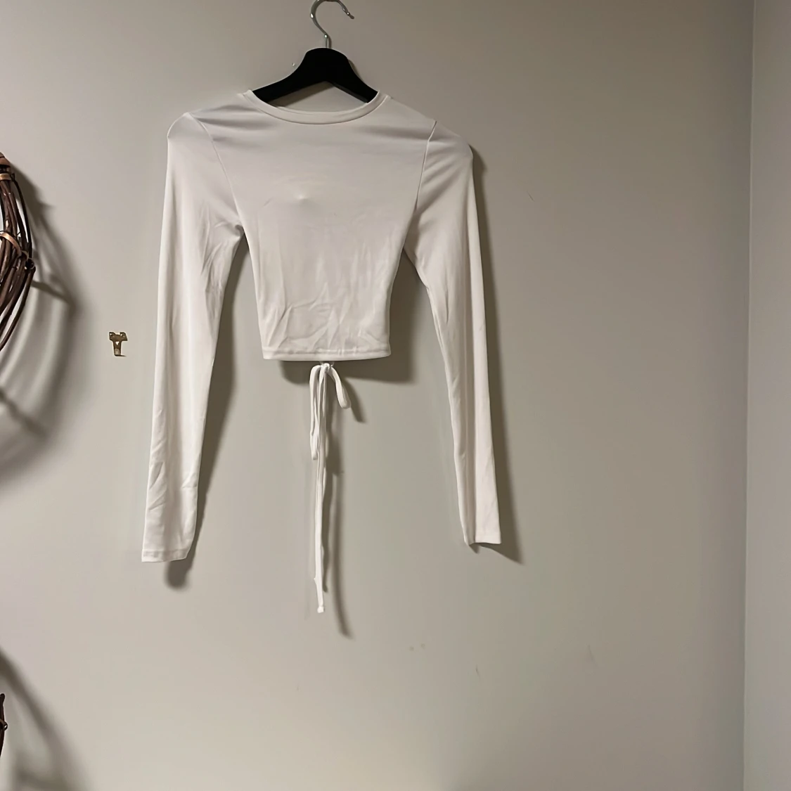 Vit långärmad topp från FB Sister