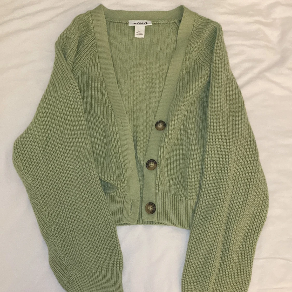 Light green cardigan