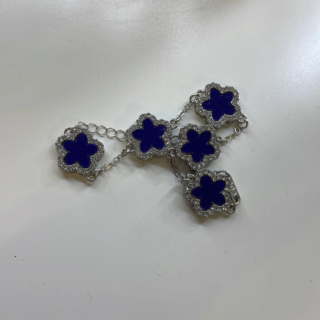 Silverarmband med blå blommor - 90