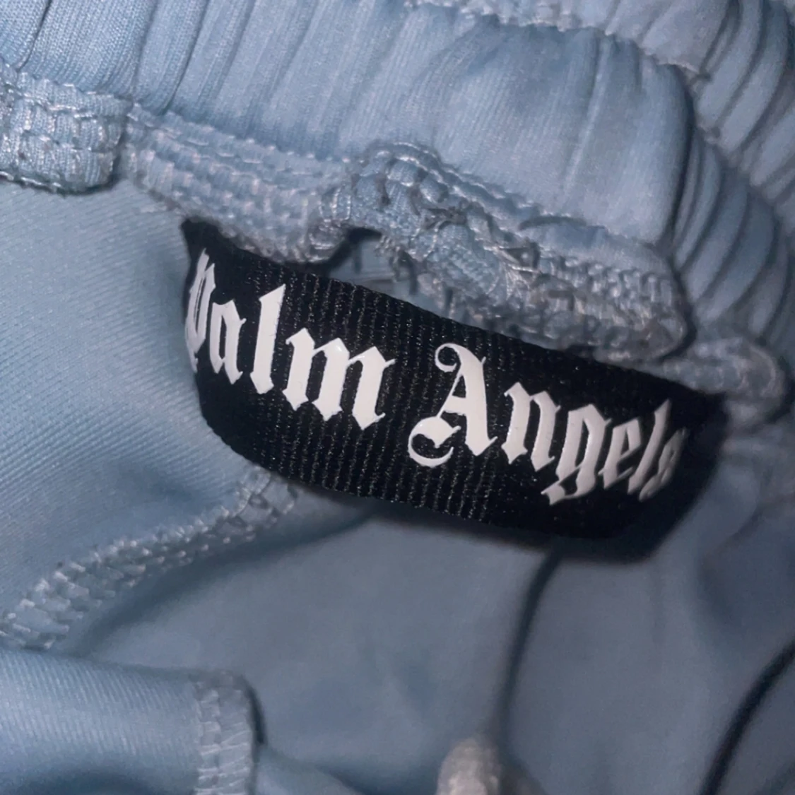 Ljusblå byxor från Palm Angels - 90