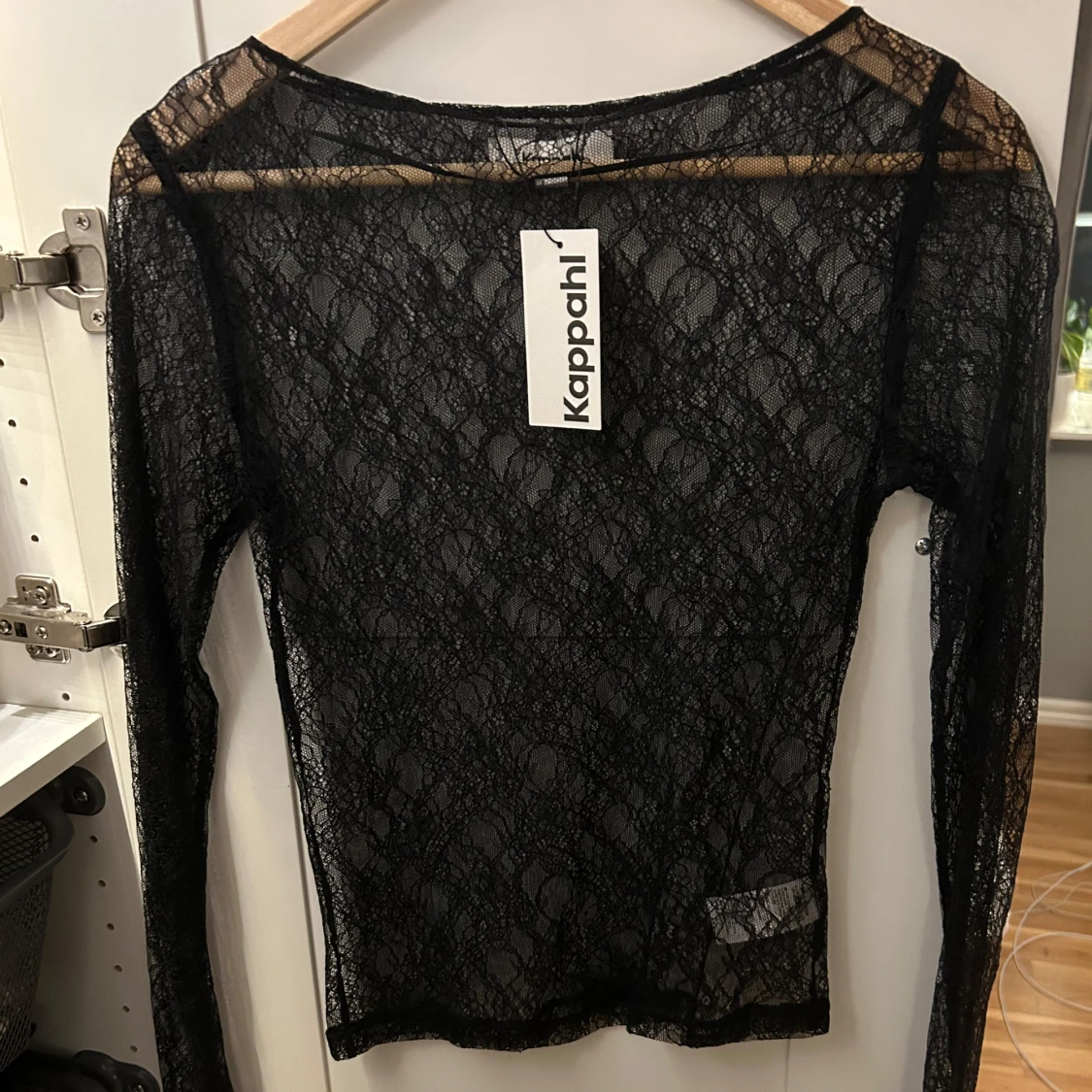 Svart spetstopp från Kappahl