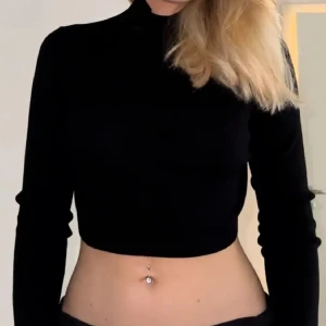 Kort halvpolo  - Kort halvpolo top långärmad