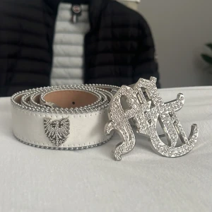 Tuttolente bälte - Asfett Tuttolente bälte i fint skick