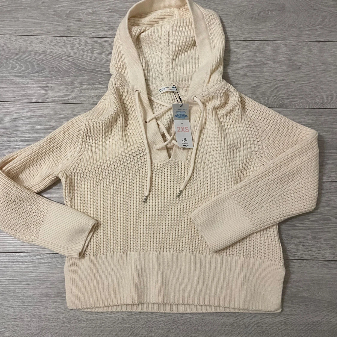 Beige stickad hoodie från Primark