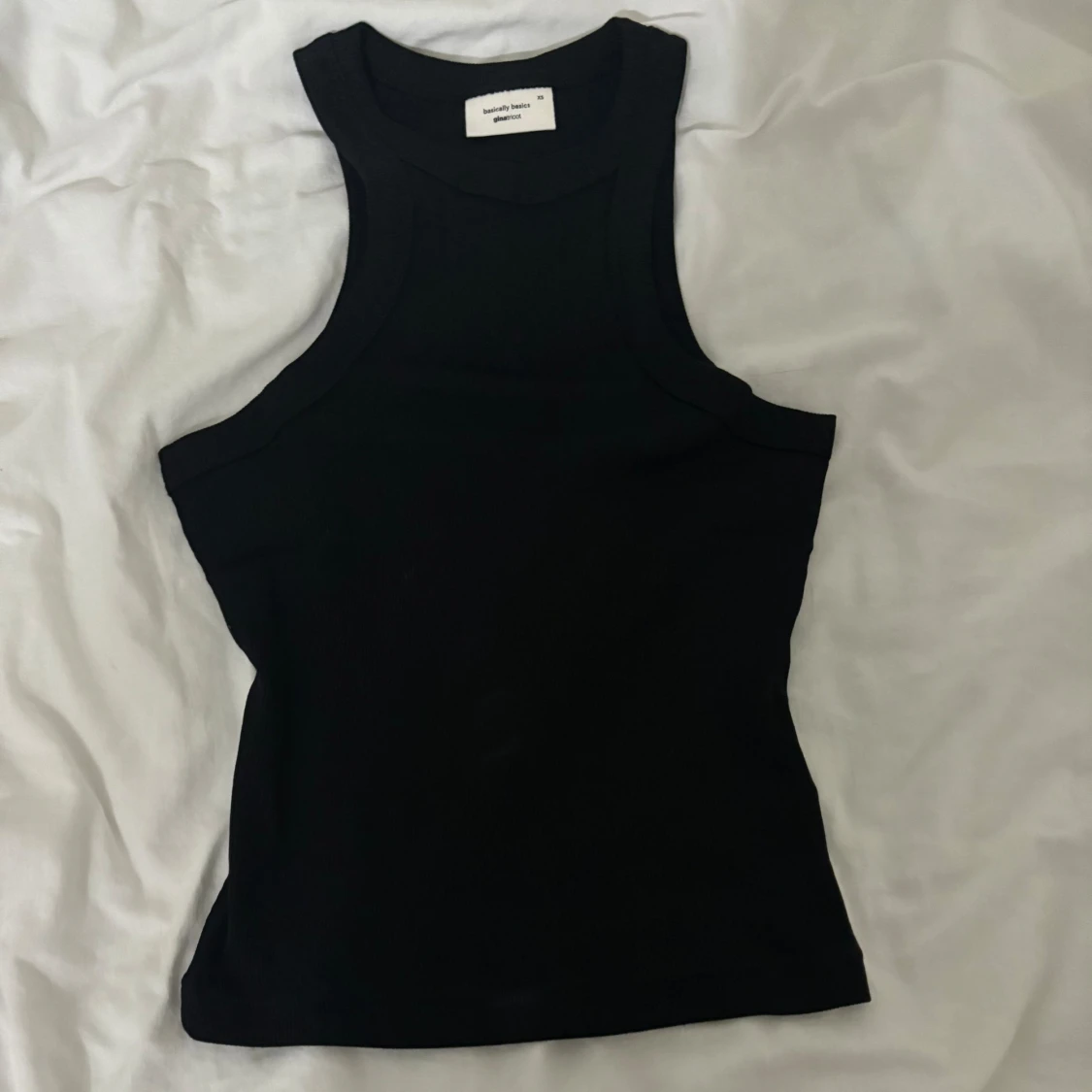 Ärmlös svart topp - 1