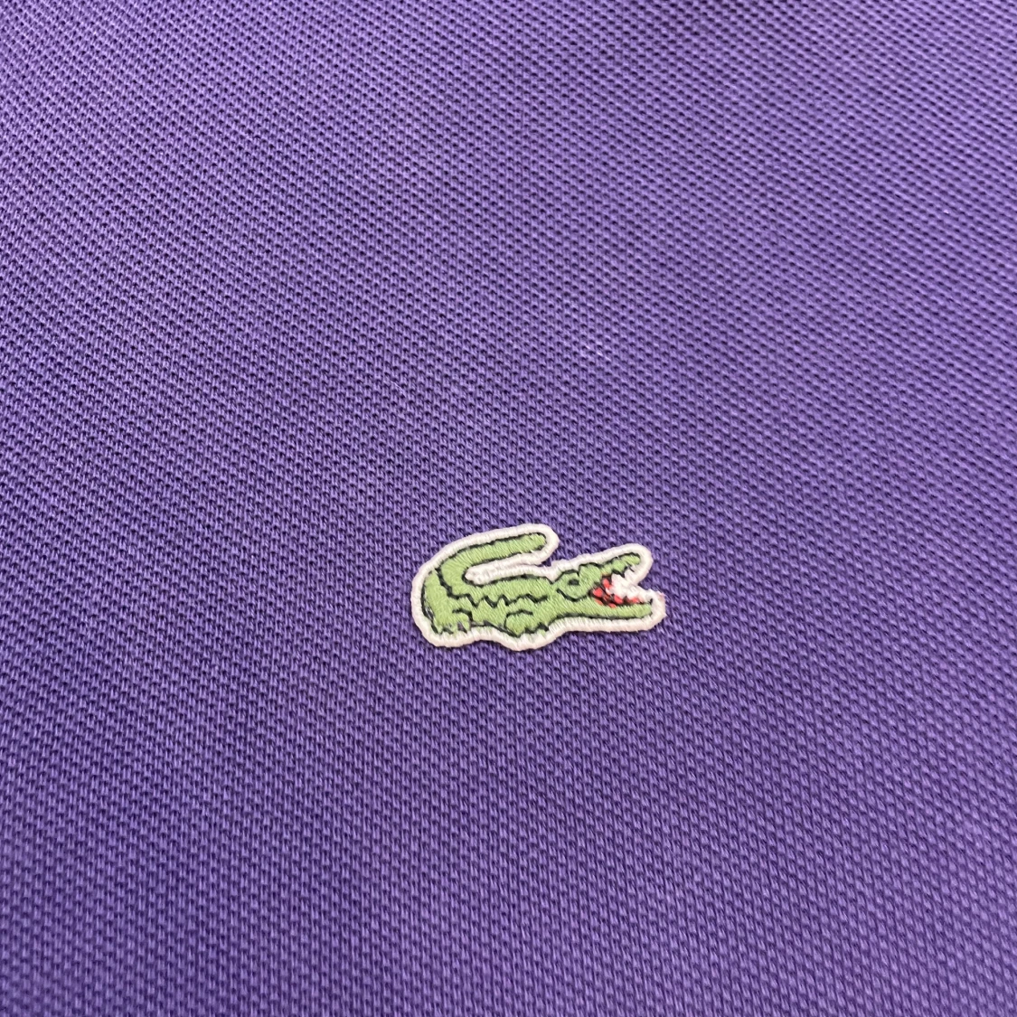 Lila pikétröja från Lacoste - 91