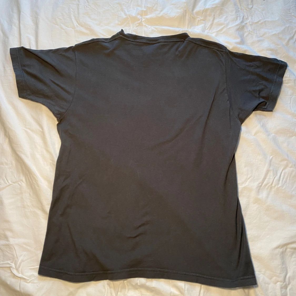 Svart T-shirt med Pelican-tryck - 90