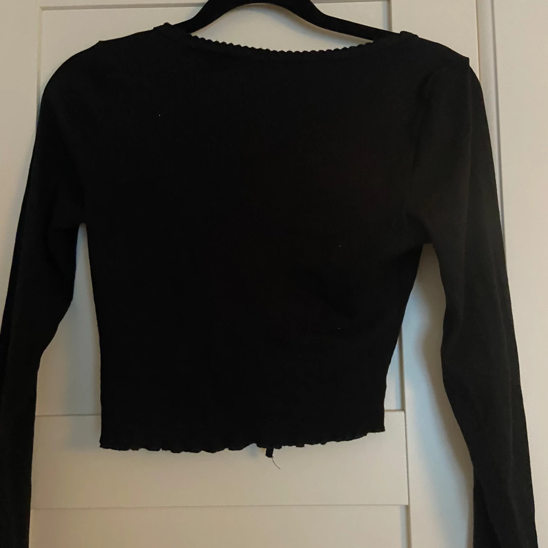 Svart kroppad tröja från hm  - 90