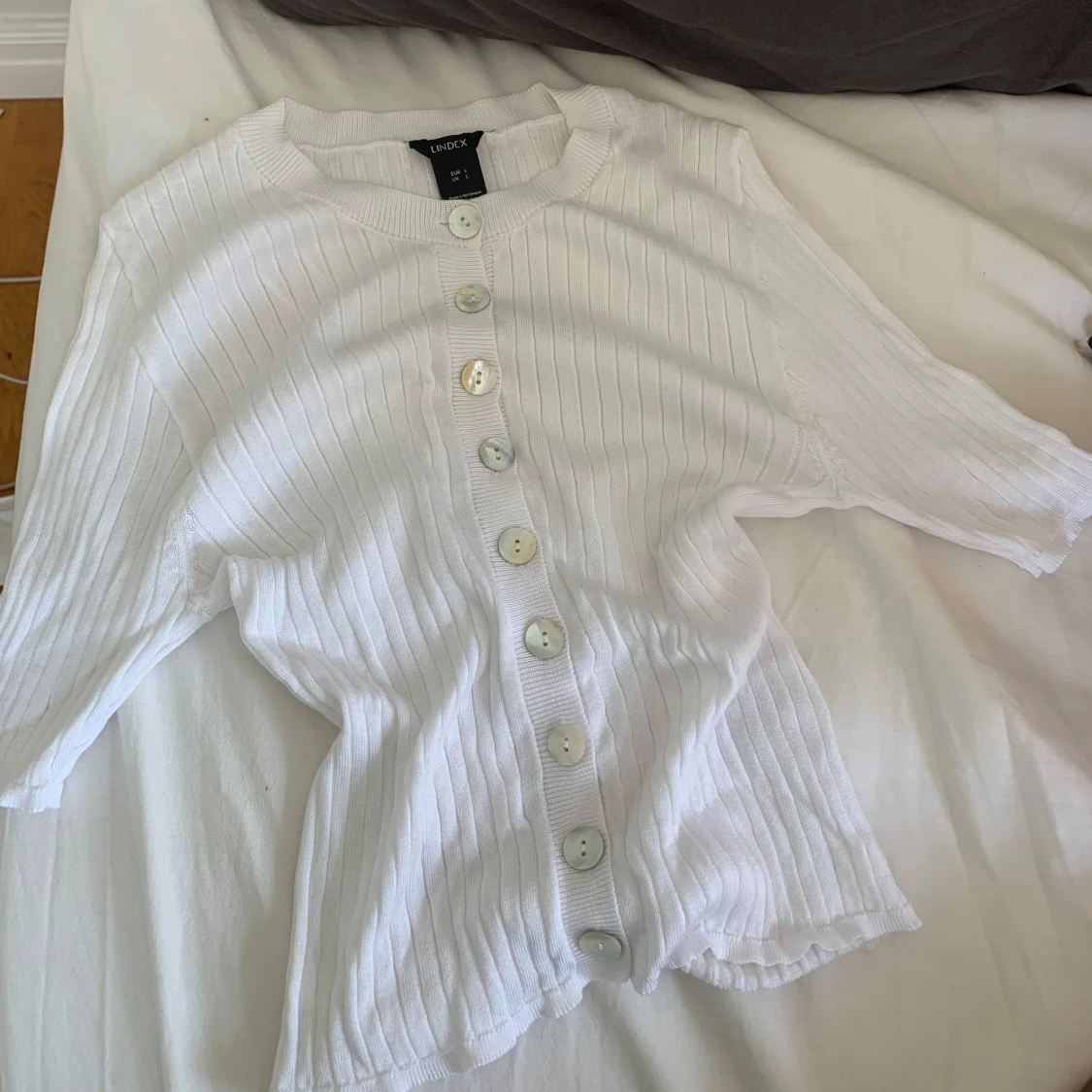 Trekvartsärmad topp