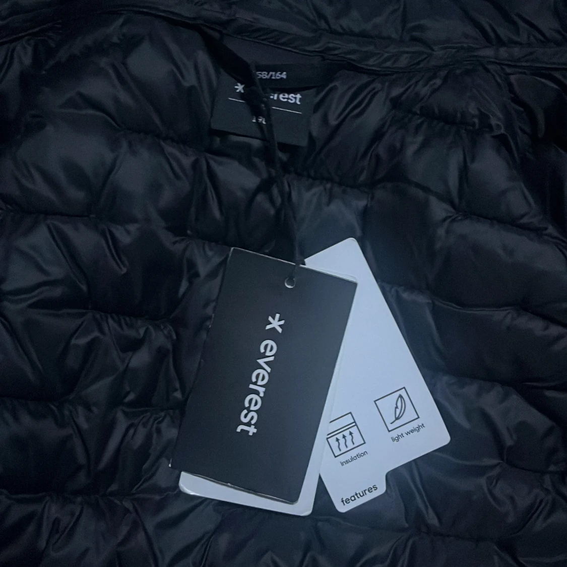Svart dunväst från Everest - 2