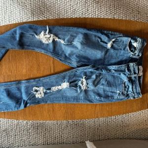 Abercrombie & Fitch Ripped Jeans - True to size. Skinny. High Rise :)