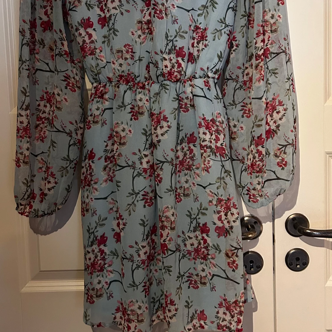 Blommig klänning från Nelly  - 91