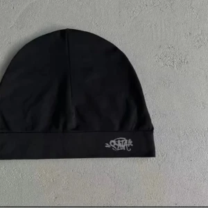 Syna world mössa - Helt ny.