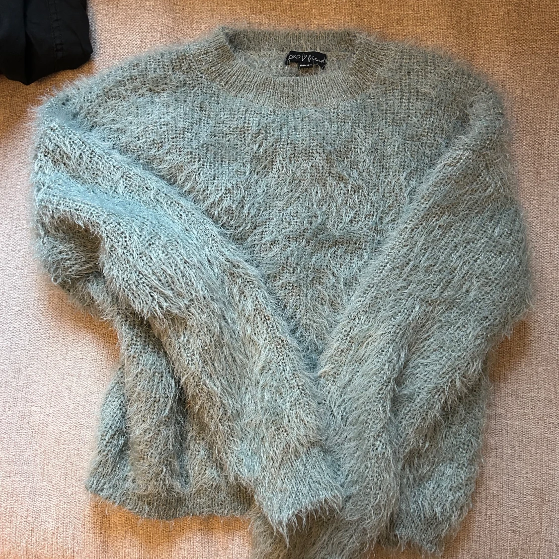 Grön fluffig tröja