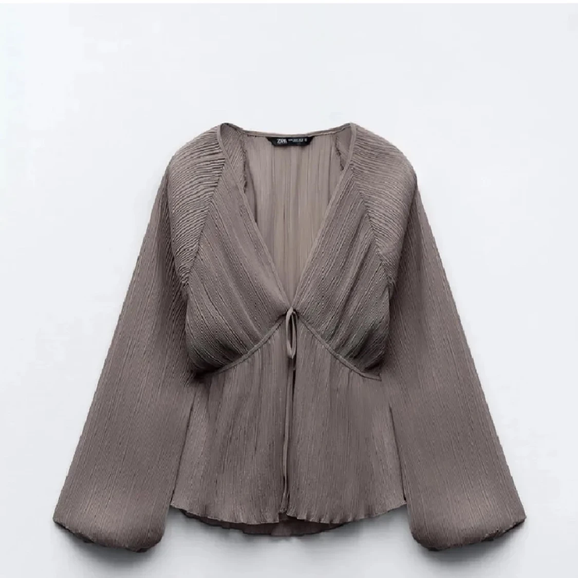 Plisserad blus från Zara