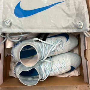 Fotbollsskor från Nike - I have several sizes of Professional Football Boots NIKE AIR ZOOM MERCURIAL SUPERFLY 10 ELITE FG MAD AMBITION - BLÄ/BLA. New Condition.