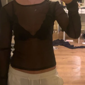 Svart glittrig topp - Använd en gång, jättefin till festliga tillfällen som tex nu till nyår