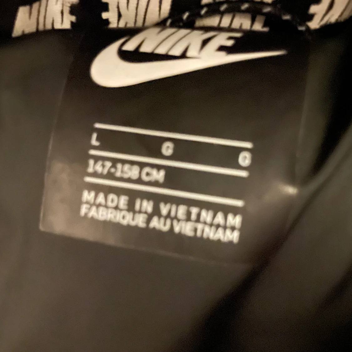 Svart dunjacka från Nike - 90