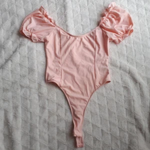 Rygglös Bodysuit - Stretchig material.