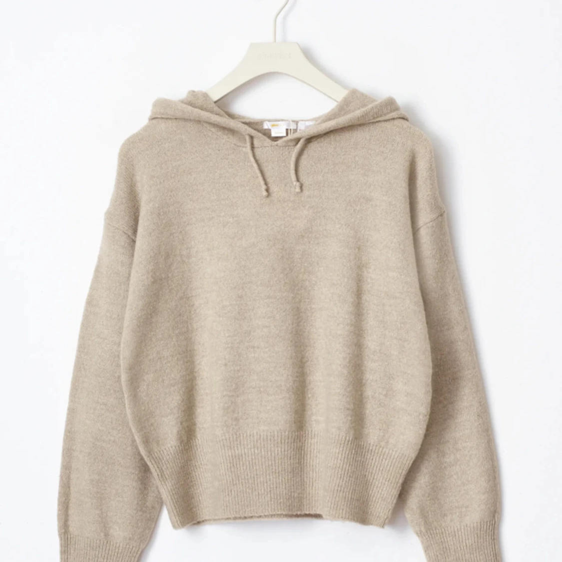 Beige stickad hoodie