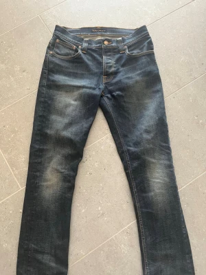 Sällsynta Nudie jeans - Ett par feta nudie jeans. Grim tim. Storlek 32/36 men sitter mer som 30/30 eller 30/32. Mycket bra skick knappt använda.          