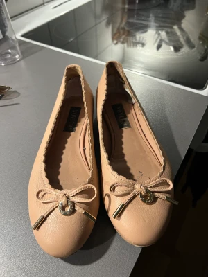 Ljusrosa ballerina - Storlek 37. Från novita