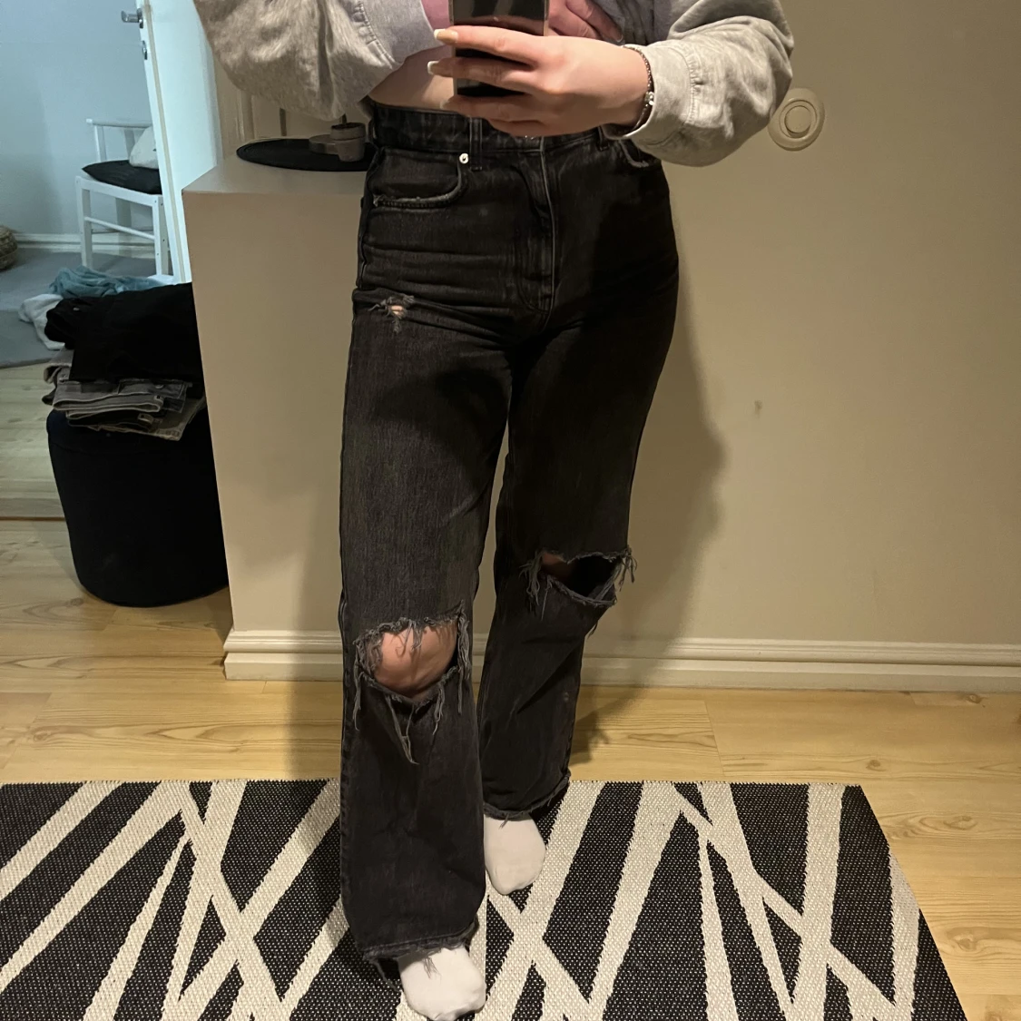 Svarta håliga jeans