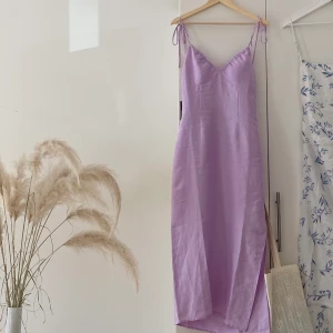 Lila klänning i linne - Lila klänning i linne