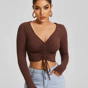 Brun tröja  - En jättefin tröja jag aldrig har använt.