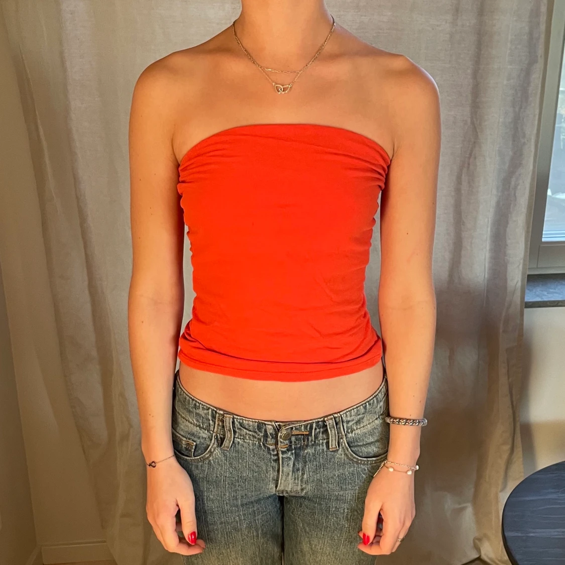 Orange/röd bandeautopp 