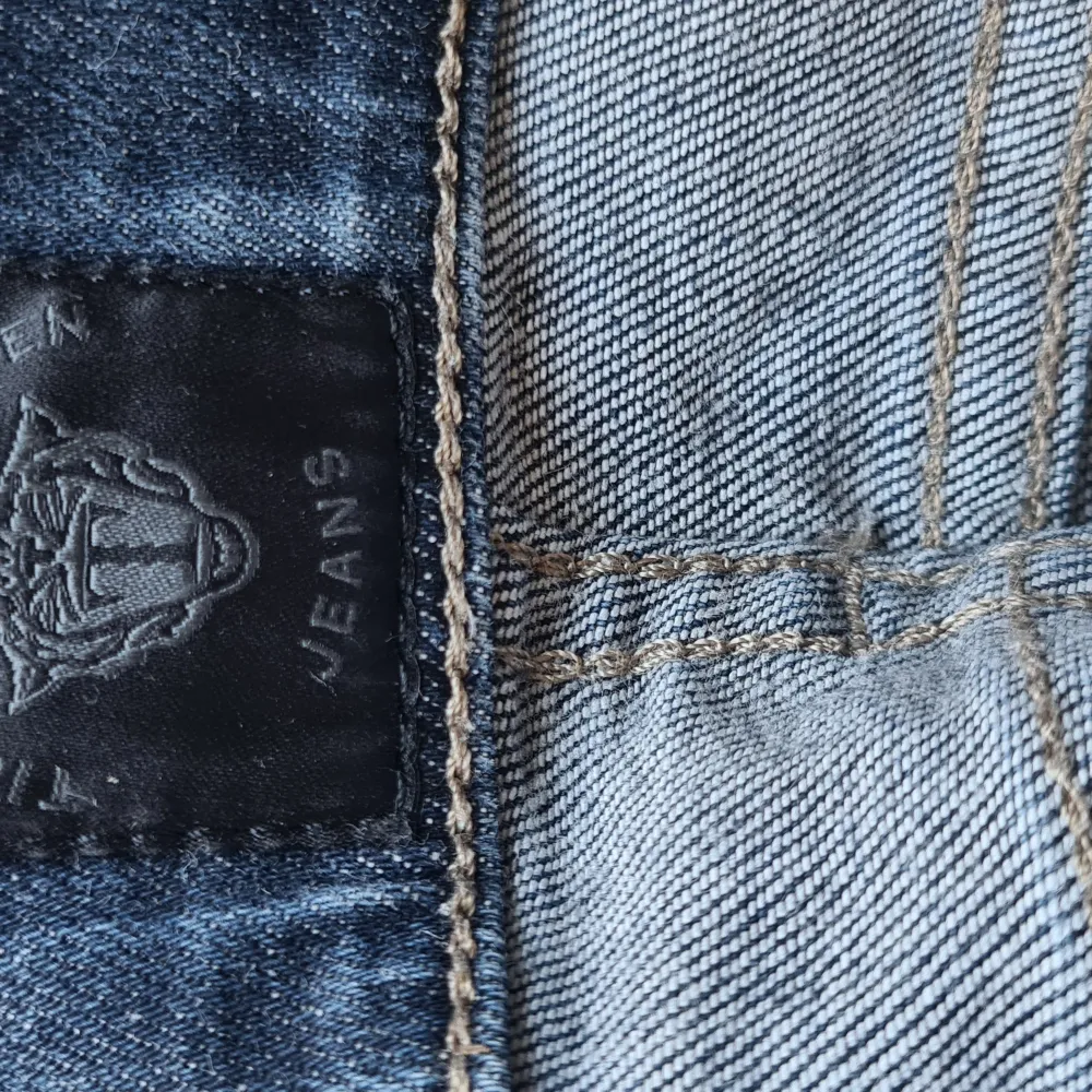Mörkblå jeans frpn Tiger ug sweden. Storlek 25/32.. Jeans & Byxor.