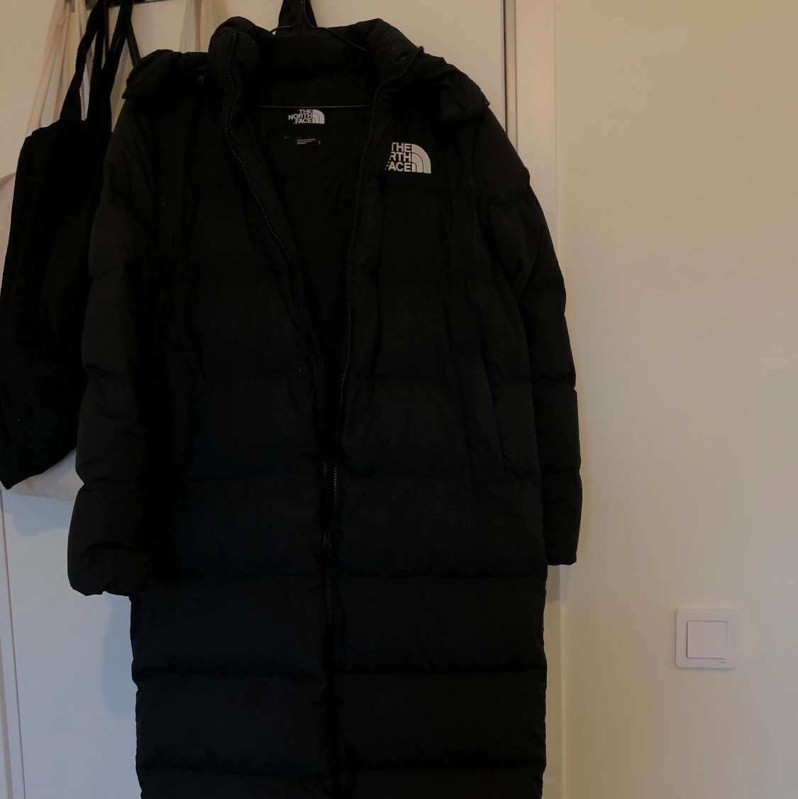 The North Face woman’s Triple C Parka   - 90