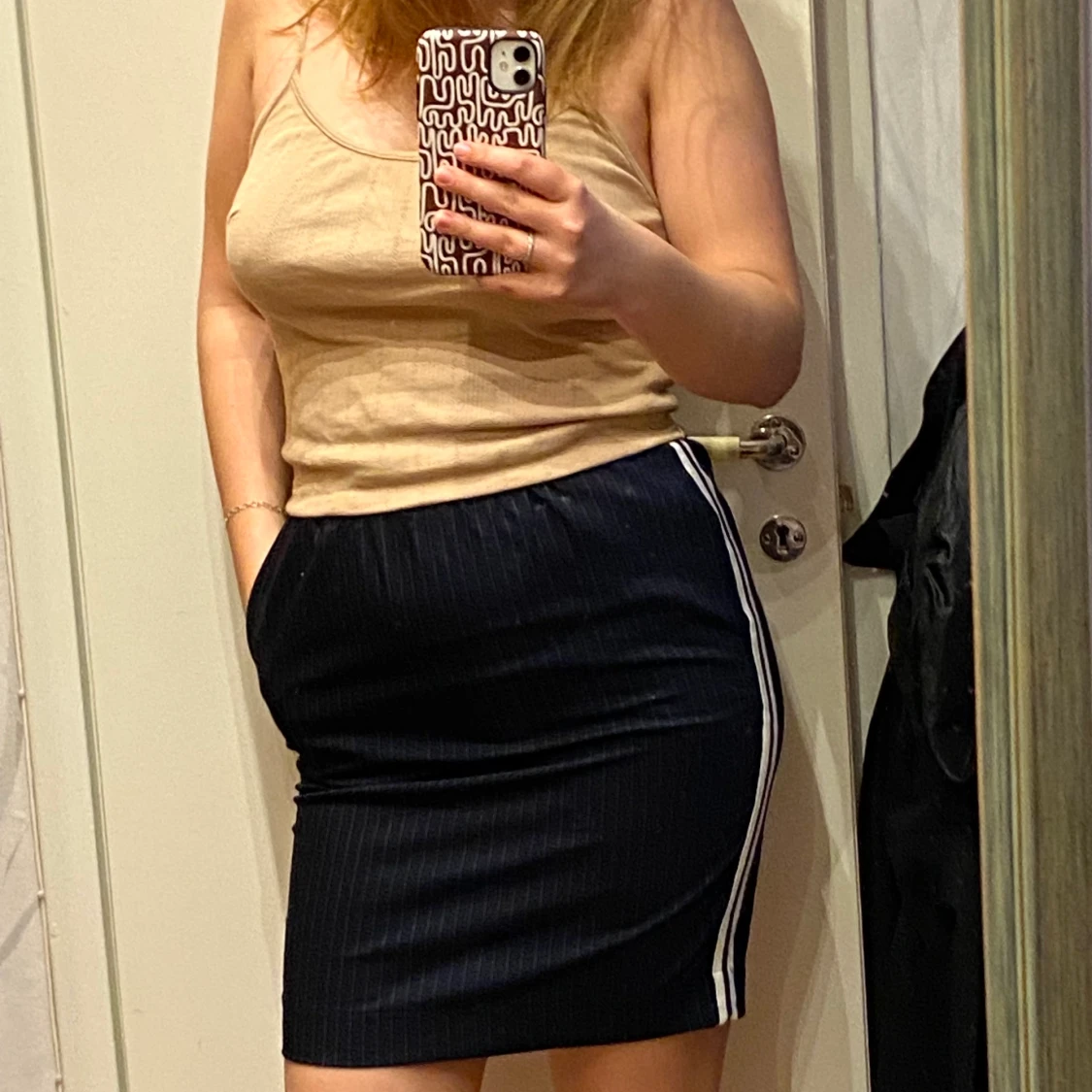 Kjol mörkblå randig med fickor - 90