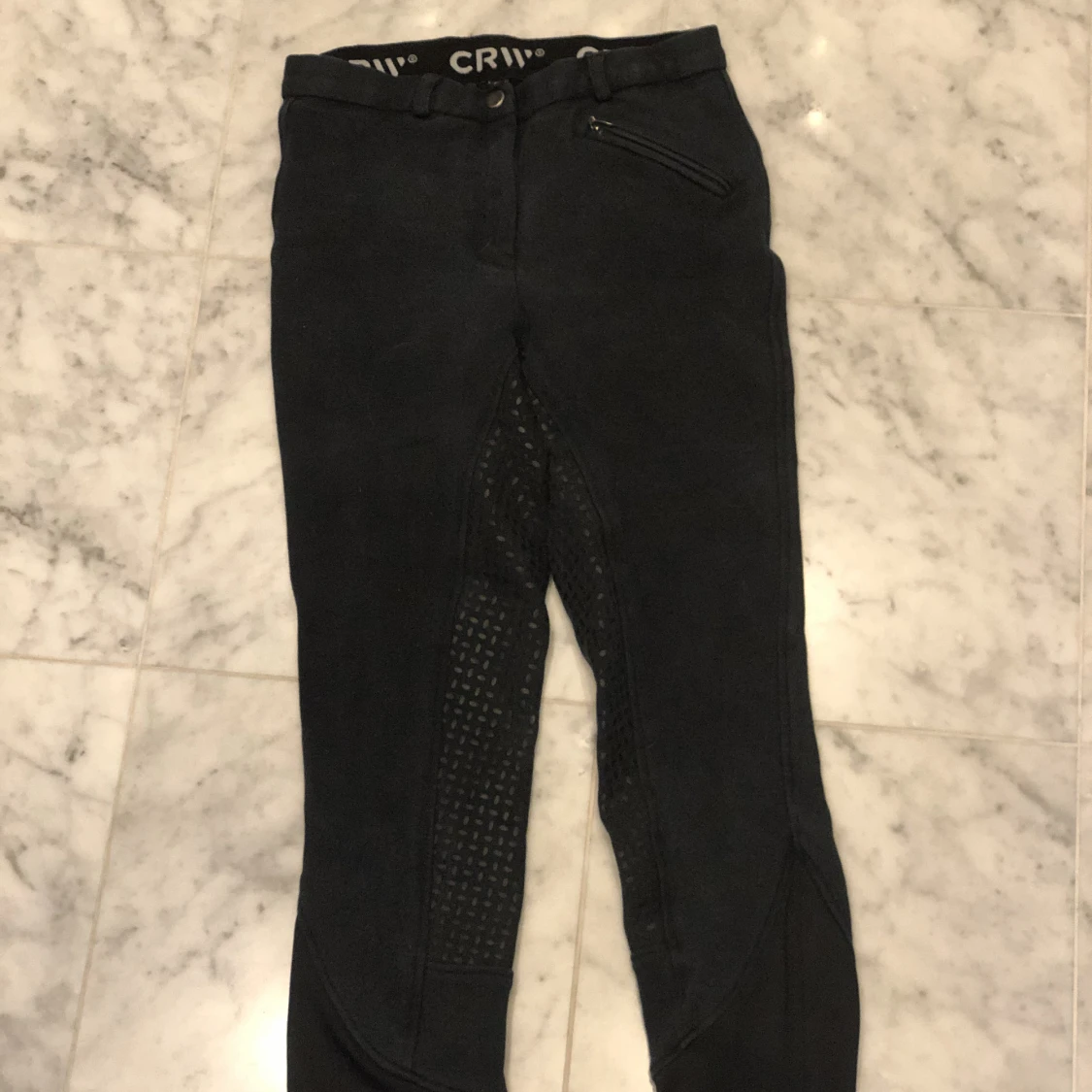 mörkblå CRW ridbyxor strl 38