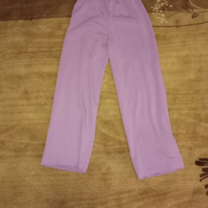 Light purple long legs weave pants. - The pants is really nice never worn and pretty good  for all events.