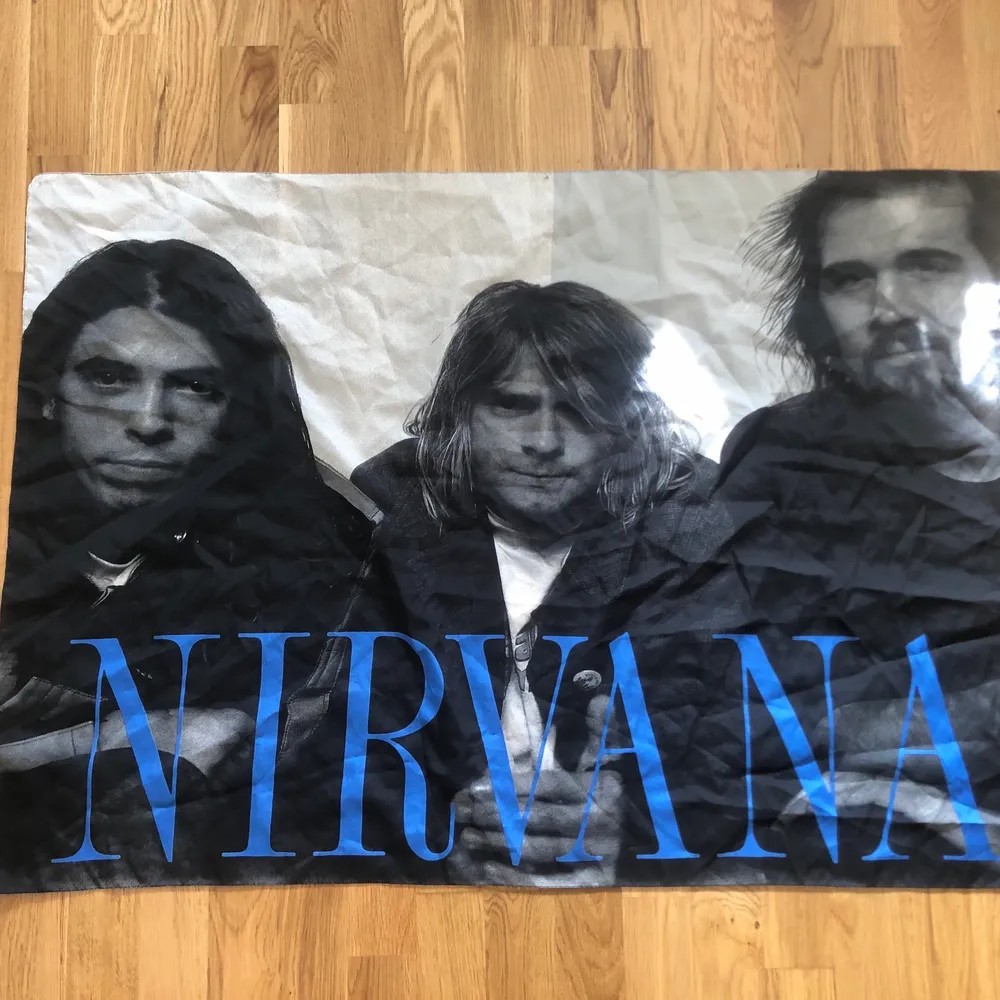 Flagg-affisch med Nirvana-motiv. Övrigt.