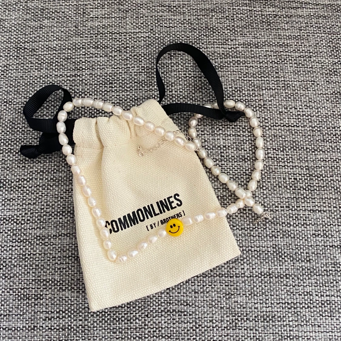 Pärlhalsband Smiley - 90