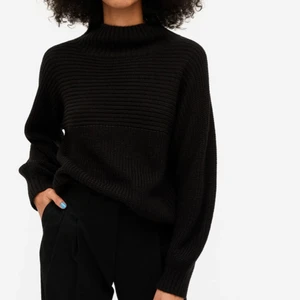 Svart stickad tröja  - Bra skick 