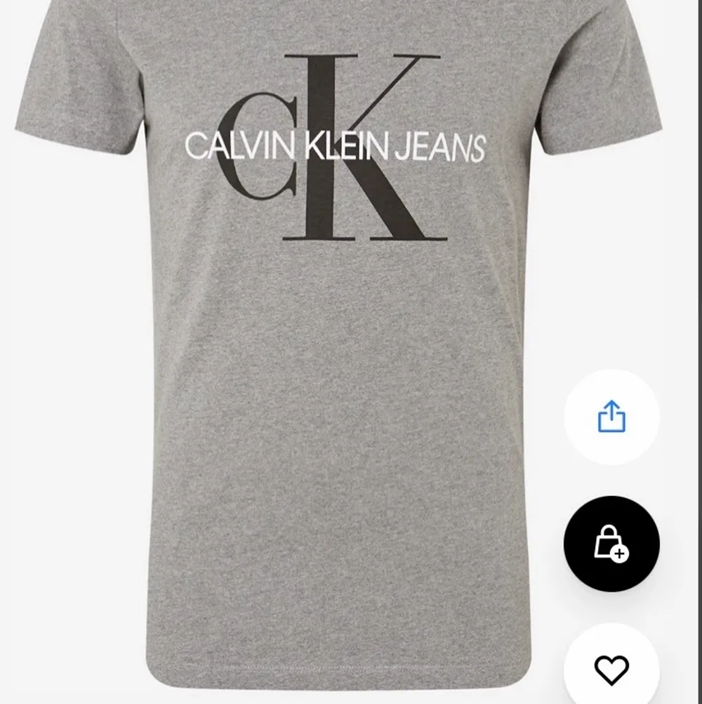 Grå stilren fin Calvin Klein t-shirt, oanvänd . T-shirts.