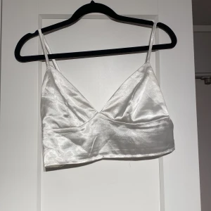 Topp  - Vitare i verkligheten. Storlek s