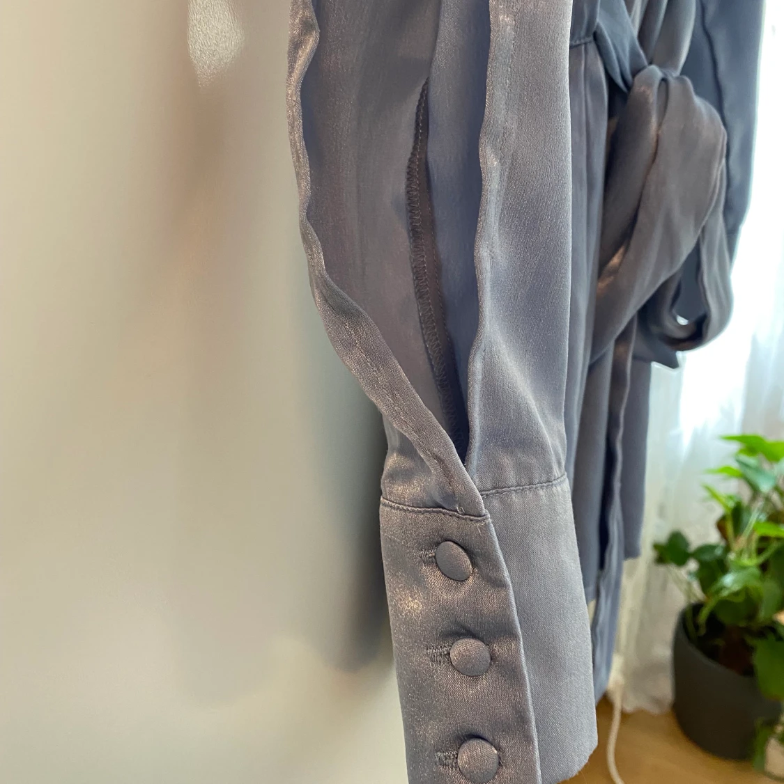 Blå playsuit med öppna ärmar - 90